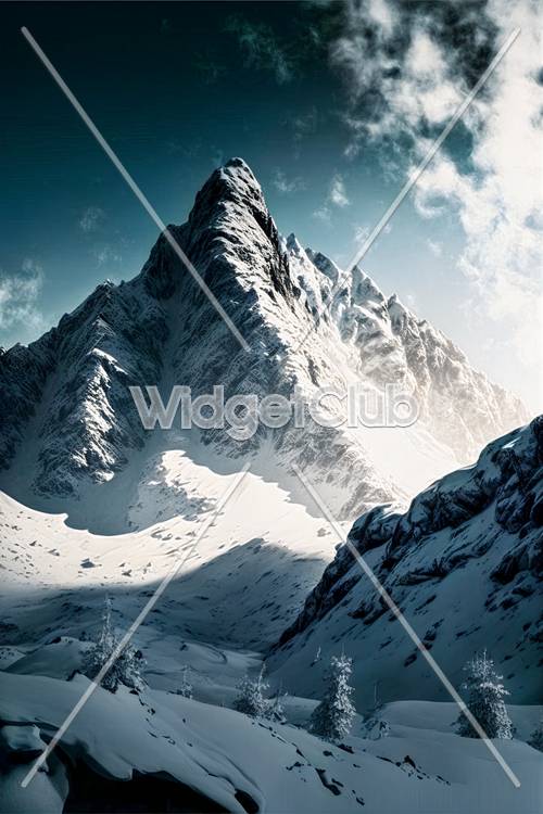 Snowy Mountain Peak Under Blue Sky